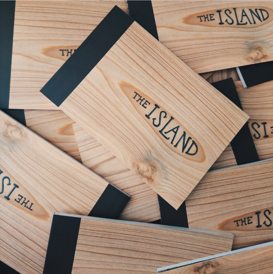 The Island Softcover Book